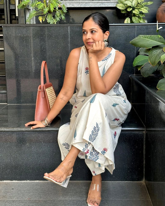 Ivory Sleeveless Kurta Set with Subtle Floral Prints