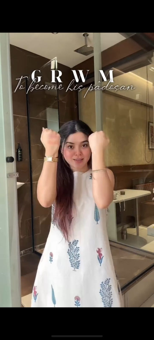 Ivory Sleeveless Kurta Set with Subtle Floral Prints